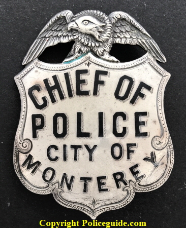 1st City of Monterey Chief of Police shield for Paul Hess appointed in 1911, made of sterling silver with hard fired black enamel.  T-pin.