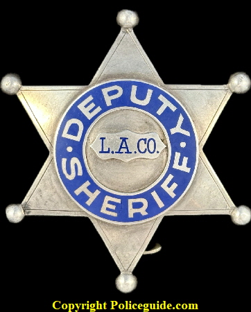 L.A. Co. Deputy Sheriff made by S. Norlinger & Sons, a 19th century Los Angeles jewelry firm known for being the first to make the reverse blue enamel stars for the Sheriff.