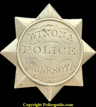 Winono Police star with 8  folded points.
