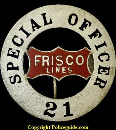 1920’s complete custom die “logo” badge from the Frisco Lines (St. Louis - San Francisco Railway Police.  Hard fired enamel logo that is the center of a circular shield. Badge is numbered 21 and hallmarked “S.G. Adams Co. St. Louis” on the back.