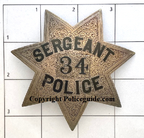 Sergeant Oakland Police #34. Sterling silver, hand engraved.  Notice the numbers were changed. Circa 1870.
