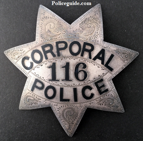 Corporal Oakland Police #116. Sterling silver, hand engraved, hallmarked Pioneer Oakland, CAL.  Worn by Peter H. Van Houtte who went on to become an Inspector.