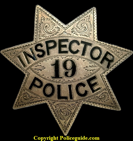 Oakland Police Inspector star #19 made by Pioneer 705 Bdwy. Oakland.  Badge is sterling silver with hard fired black enamel and worn by J. S. Dufton who was appointed 1-1-1896.  He was born 2-12-1875.