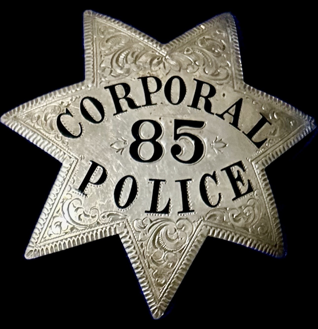 Oakland Police Corporal star No 85 worn by M. O'Reilly who was appointed to the department on 10-10-1906. Made of sterling silver. Oakland Police Corporal star No 85 worn by M. O'Reilly who was appointed to the department on 10-10-1906. Made of sterling silver.