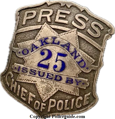 Press Oakland 25  Issued by Chief of Police Oakland, made by Ed Jones Co. Oakland, CAL Sterling.