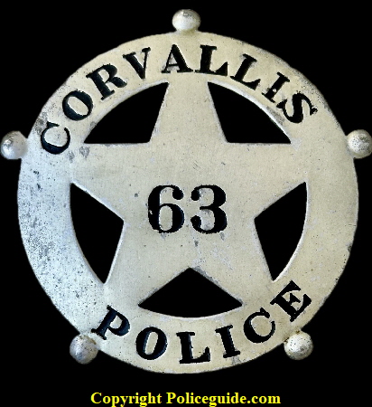 Corvallis Police badge No. 63.
