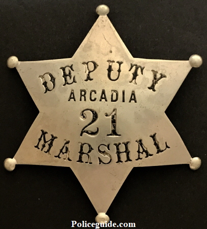 Arcadia Deputy Marshal badge #21.  Made by Chipron Stamp Co. L. A. Cal. Circa 1910