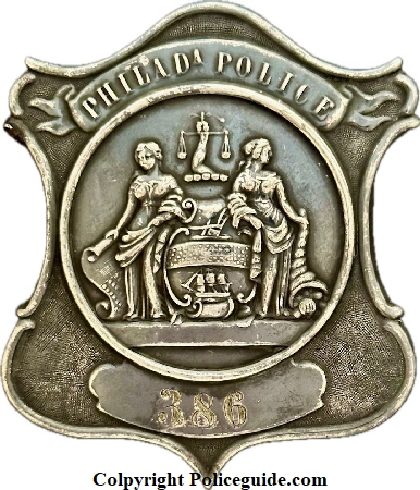 Philadelphia Police shield No. 386, made of silver and inscribed on the reverse, Thomas Speer 2212 Wood St.