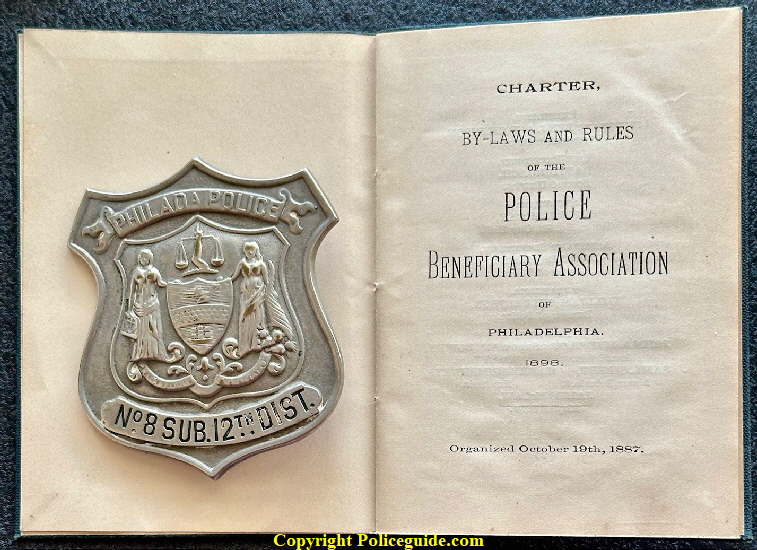 Caleb J. Brinton�s P.B.A. book dated 1898 along with his 1884-1888 issue shield.