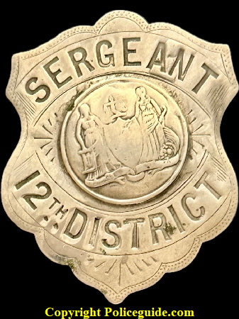 Caleb J. Brinton�s Sergeant 12th District issue shield.