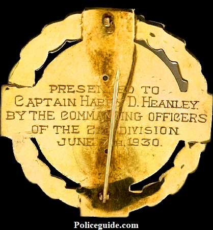 Back of badge showing presentation:  Presented to Captain Harry D. Heanley By the Commanding Officers of the 2nd Division June 7th, 1930.