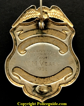 Presentation reads “An expression of friendship from W. M. Veale 1931.