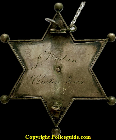 Back of Chief of Police presentation badge to J. Whitson Clinton, Iowa 1886.  Jeweler made, sterling silver.