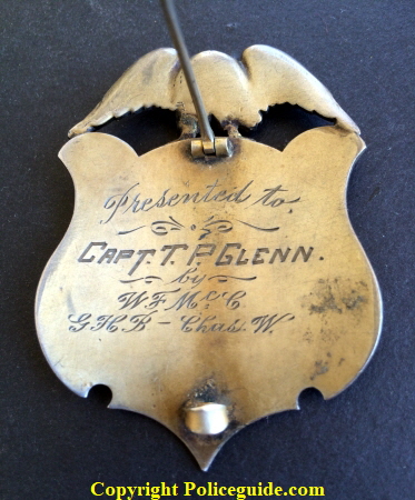 Sterling presentation badge, presented to Captain T. P. Glenn by W.F. Mc G / GHB - Chas. W.
