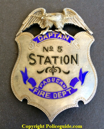 Captain No 5 Station Paducah Fire Dept. sterling silver presentation badge.  Obverse reads Presented to Capt. T. P. Glenn by W. F. Mc C. / G. H. B. - Chas. W.