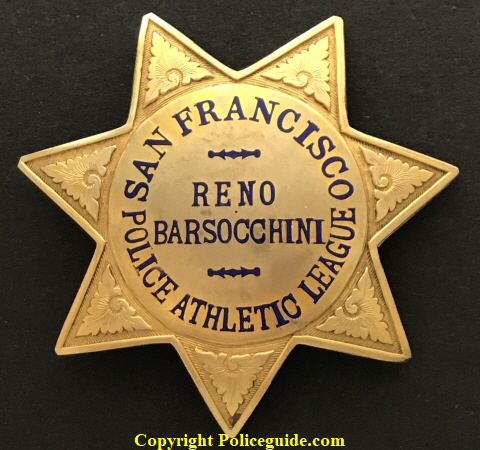 Presentation badge of Reno Barsocchini from the San Francisco Police Athletic League.  Made by Irvine & Jachens and stamped Gold Filled.