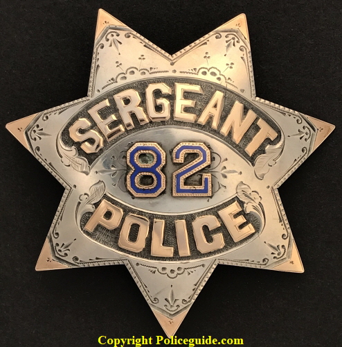 San Francisco Sergeant #82 made of sterling silver with 14k gold letters and inlay on each point. 