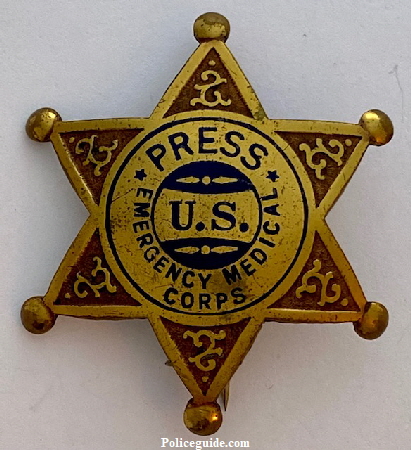U. S. Emergency Medical Corps Press badge made by Chipron Stamp Co.  #261 stamped on back.