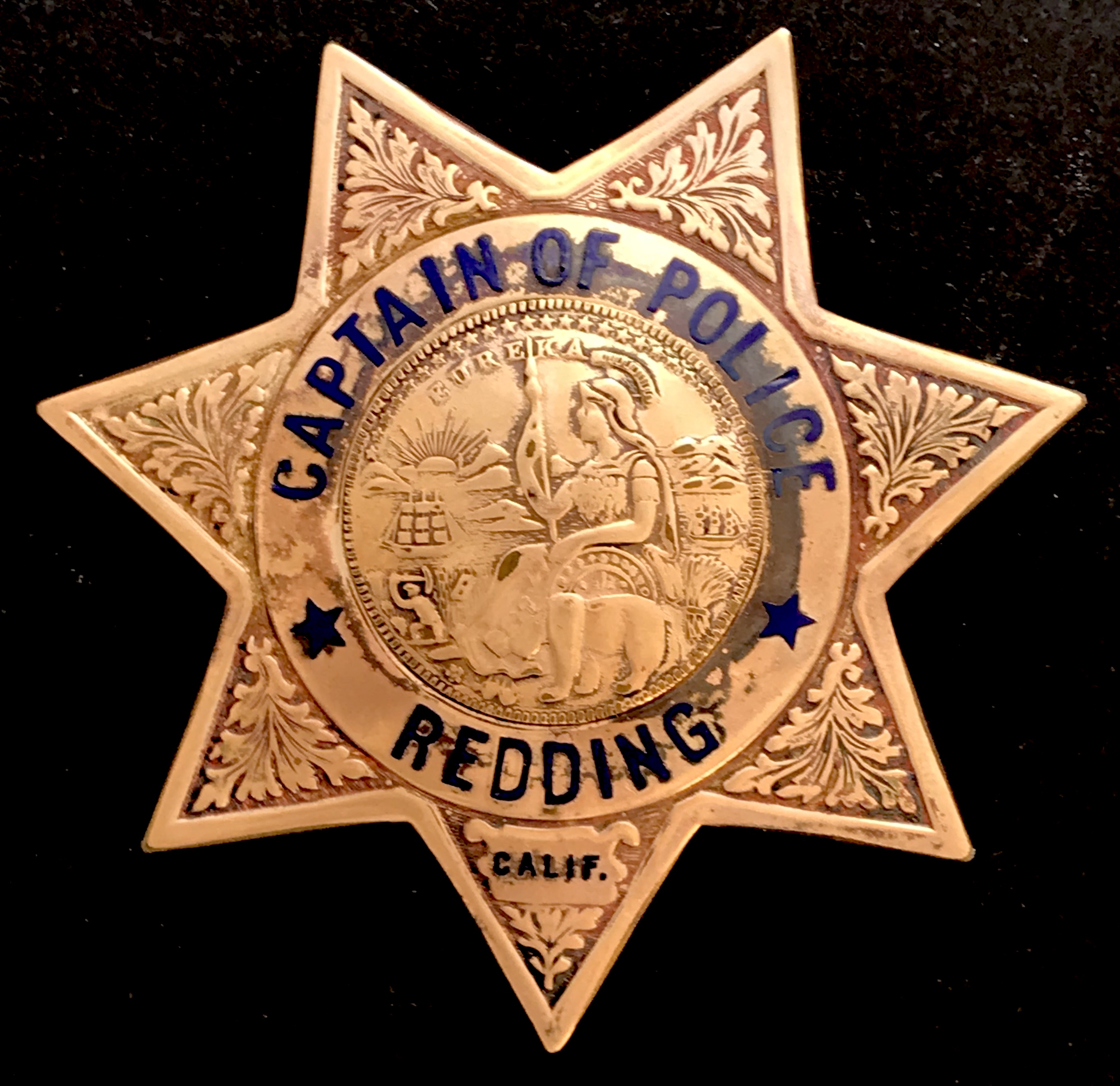Personal badge of Bob Coulter Redding Police Captain.  Made by Ed Jones Oakland, CAL.  Gold Front.