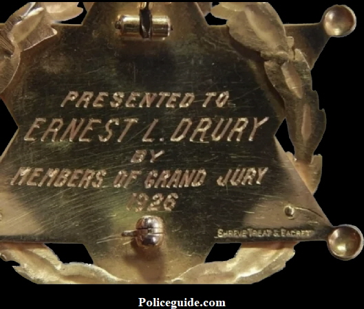 Back of San Francisco Jury Foreman 1926-27, Presented to Ernest L. Drury by Members of Grand Jury 1926.  Made by Shreve Treat & Eacret Company". Badge is made from14K solid gold and weighs 14.78 grams.