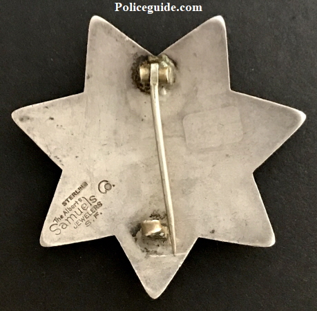 San Francisco Police Women Protective Officer badge #2, made by The Albert Samuels Co. Jewelers S. F.. Sterling.  Two women were issued badge #2, Mrs. Belle Love Dec. 19, 1908 and Katheryene C. Eisenhart Oct. 20, 1913.