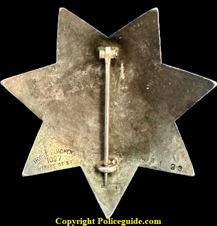 Back of Detective Sergeant star showing hallmark by Irvine & Jachens 1027 Market St. S.F. STERLING and the date 7-1-23