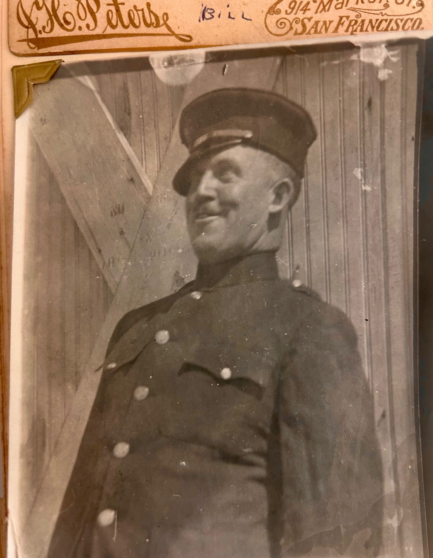 Police Officer Wm. P. Sullivan clowning for the camera.