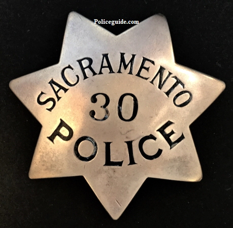 Sacramento Police badge #30 worn by James V. Hicks.