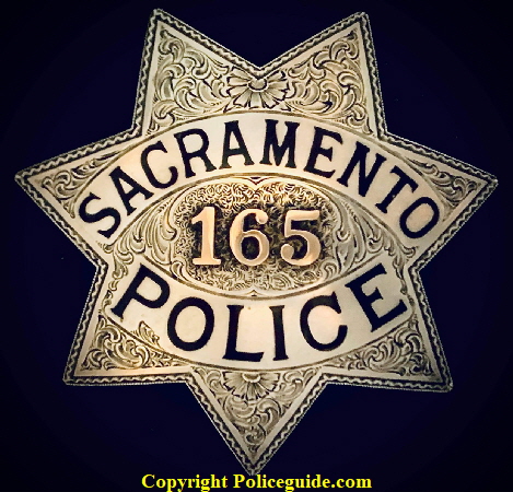 Engraved sterling silver Sacramento, CA police badge #165.