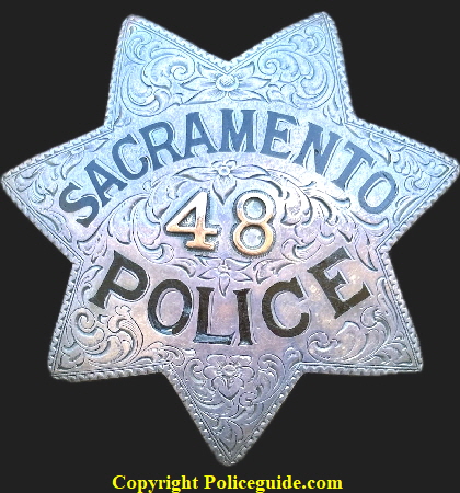 Sacramento Police star No. 48 presented on the reverse to Leslie C. Mills, Dec. 22, 1936 From Bea. Badge is sterling silver and hand engraved. Made by Ed Jones & Co. Oakland CAL. Sacramento Police star No. 48 presented on the reverse to Leslie C. Mills, Dec. 22, 1936 From Bea. Badge is sterling silver and hand engraved. Made by Ed Jones & Co. Oakland CAL.