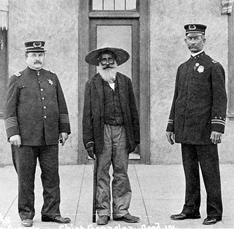 Circa 1911:� Captain Moriarty standing with Antonio Gonzales who was the Chief of the 1838 Mexican Town Police and standing on the right is Chief Keno Wilson.