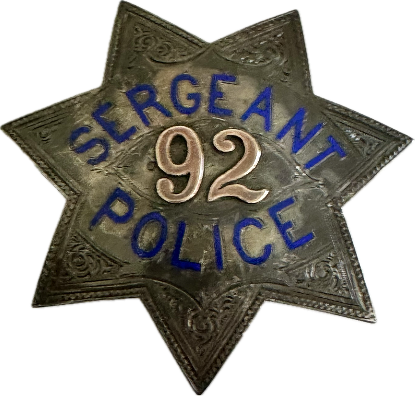 San Francisco Police Sergeant star No. 92 issued to Charles H. McDonald who was appointed a Patrolman on April 14, 1878 and promoted to Sergeant December 1895.  The star is 3 5/16 tall. Sterling silver with hard fired blue enamel lettering and 14k applied gold numbers.
