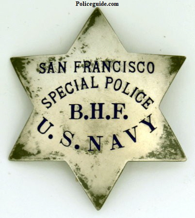 S.F.P.D. Special Police badge issued to a Military Police Officer U. S. Navy, who worked side by side with a regular S.F.P.D. officer. The officers initials B.H.F. appear on the badge. Made by Irvine & Jachens San Francisco and dated on the reverse 8-7-31. Sterling.
