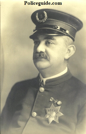 This press image of Officer Peter J. Benjamin was taken in 1917 at Police Headquarters.