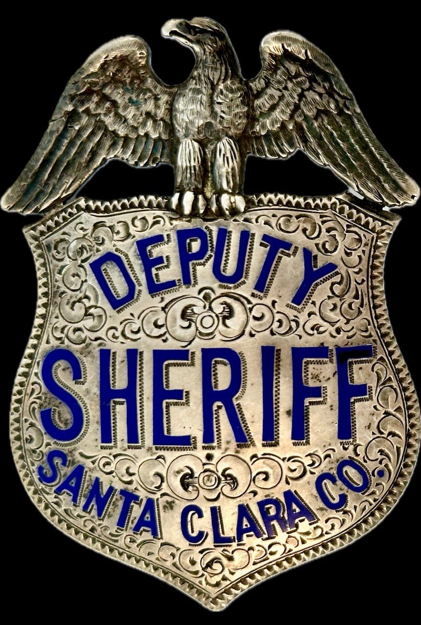 Santa Clara County deputy sheriff eagle top shield, circa 1920.  Made of sterling silver with hard fired blue enamel and hand engraved.