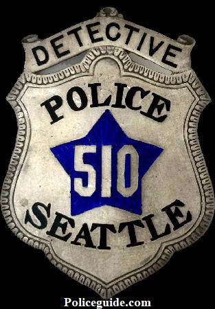 Seattle Police Detective 510 made of sterling silver with hard fired blue enamel.