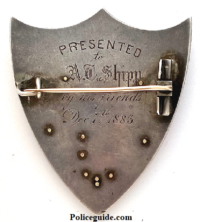 Back of Sargent of Police No. 3 St. Louis, MO Police Dept.  Made of sterling & gold.  Presented to Sgt.Anderson T. Shipp.