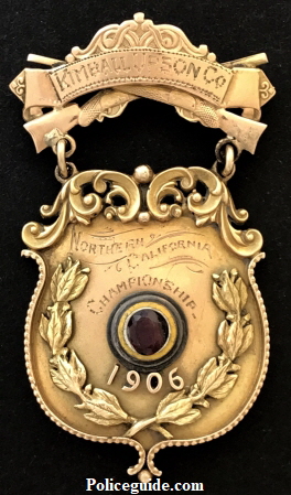 Gold shooting medal presented by a Sacramento merchant Kimball & Son Co. in 1906 at the Northern California Championship shooting tournament.
