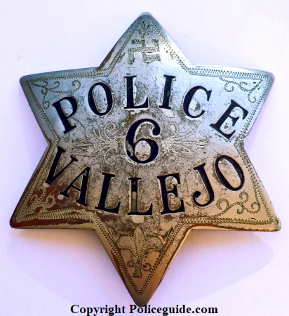 1st issue Vallejo Police star No. 6 with hand engraved scrolling and a “Good Luck Swastika” in the top point. 1st issue Vallejo Police star No. 6 with hand engraved scrolling and a “Good Luck Swastika” in the top point.