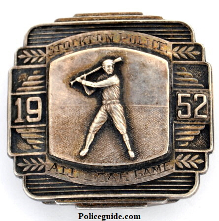 2 ounces of silver were used to create this 1952 Stockton Police All Star Game buckle.