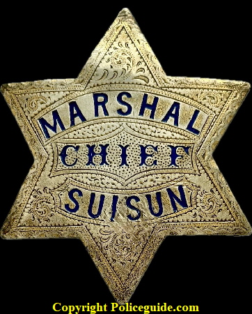 Suisun Chief Marshal. This badge looked like it had been through the Great Earthquake of San Francisco when I got it. All the enamel in the lettering had been knocked out and some of the points were bent. I took it to a jeweler to have it restored as best he could and I think it came out pretty well. Worth saving because it was made by J. C. Irvine 751 Market St. S. F. Circa 1900-1906. Suisun Chief Marshal. This badge looked like it had been through the Great Earthquake of San Francisco when I got it. All the enamel in the lettering had been knocked out and some of the points were bent. I took it to a jeweler to have it restored as best he could and I think it came out pretty well. Worth saving because it was made by J. C. Irvine 751 Market St. S. F. Circa 1900-1906.