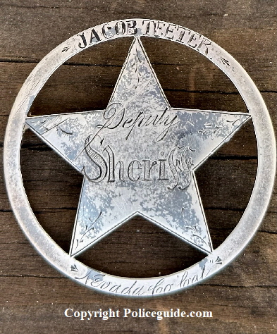 Jacob Teeter was a Nevada Co. deputy sheriff and was presented this badge by Sheriff Carter in January 1884, see article below.  Made of sheet silver and jeweler made.