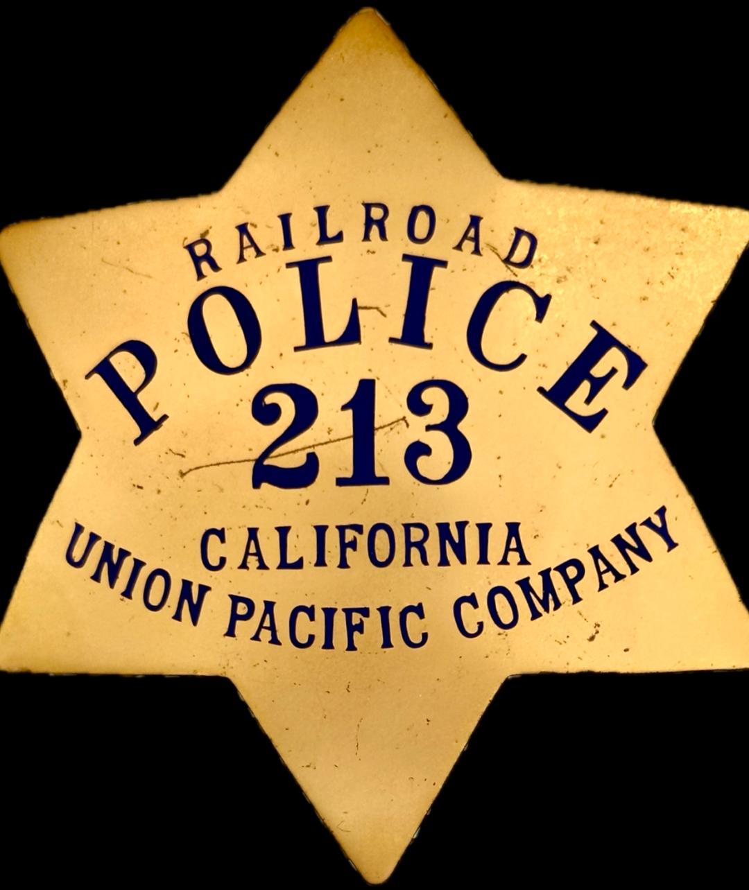 Railroad Police 213 California Union Pacific Company.  Made by Ed Jones Co. Oakland, CAL