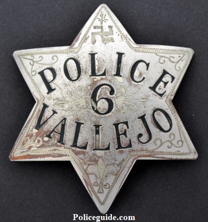 Vallejo Police star #6, worn by George Newton Frazer who served Vallejo Police from 1905 till he started as a Solano Co. deputy sheriff in 1927.  Hallmarked by Irvine W. & Jachens.  Hand etching appears added after the badge was issued including the Swastika which was a good luck symbol for hundreds of years before the Nazi’s used it.