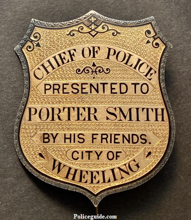Beautiful gold overlay on sterling silver presentation badge.  Enameled engraving around the border adds to the appeal of this Wheeling, West Virginia badge presented to Porter Smith.  Circa 1885.