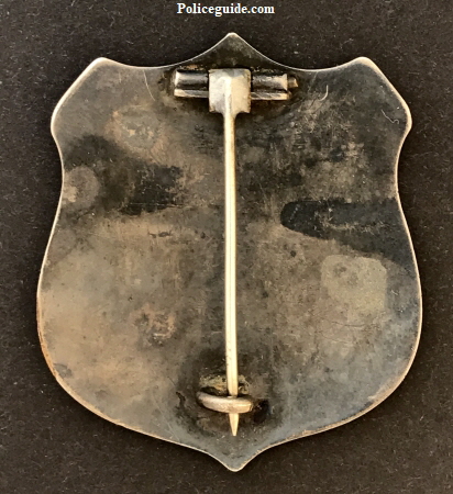 Wheatland Marshall badge made of sheet silver, T-pin and C-catch.  Circa 1900.